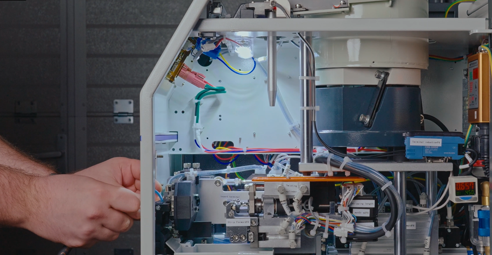 Inside an automated cable processing machine