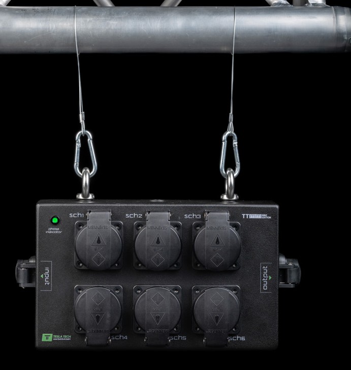Modular PDU suspended from a truss with two M8 eye bolts and steel cables