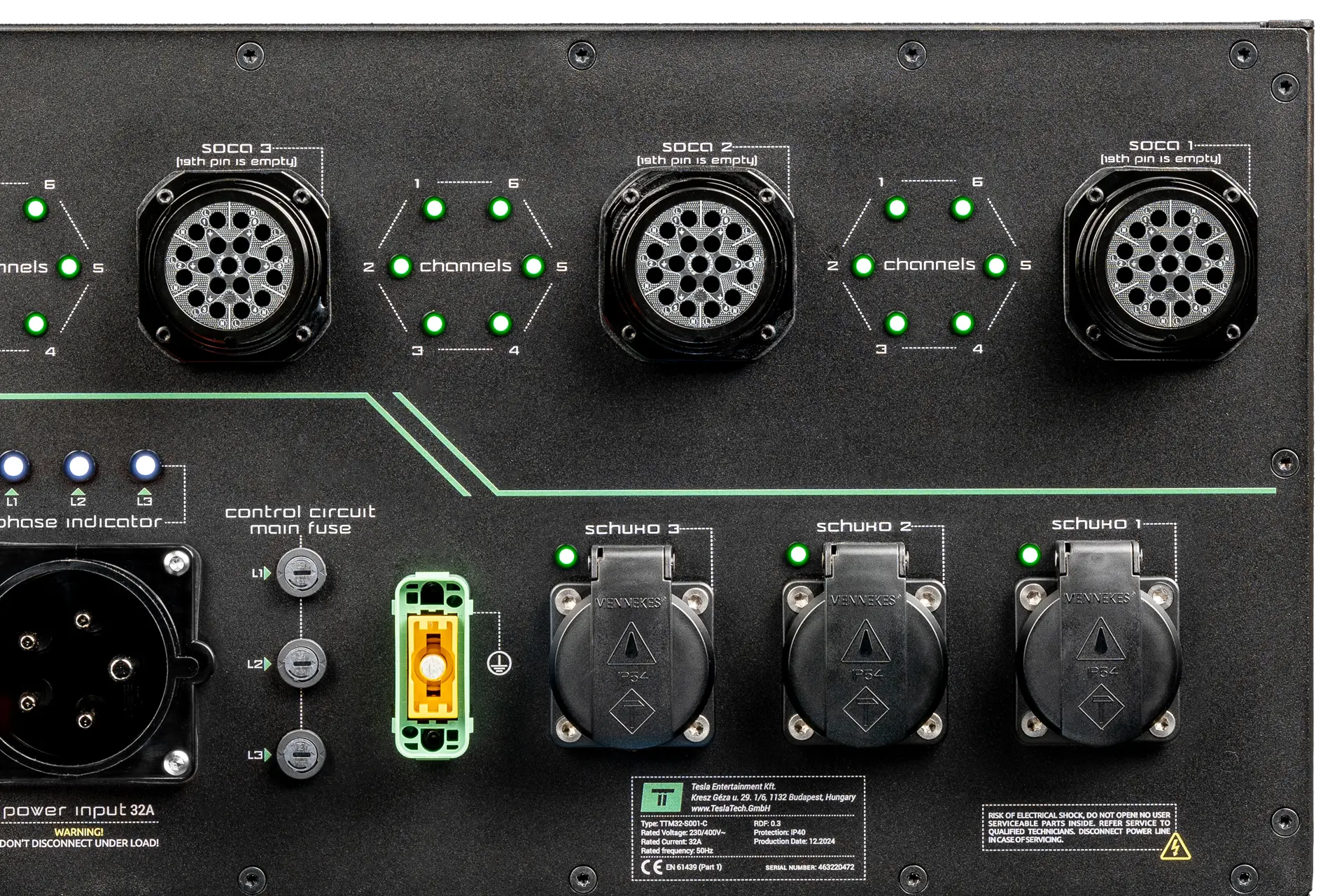 Close-up of the TTM32-001 rear panel with three Socapex outputs and channel LEDs, the 32A power input and three Schuko outputs